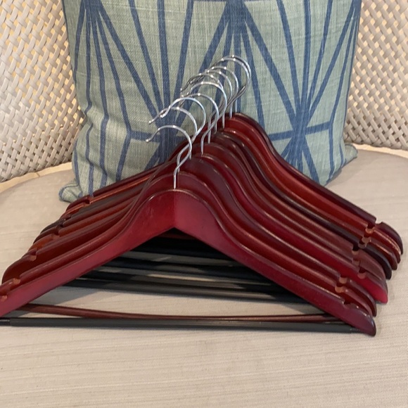 Other - ON HOLD-@crazycupkake101
 Set (10) Wooden Hangers